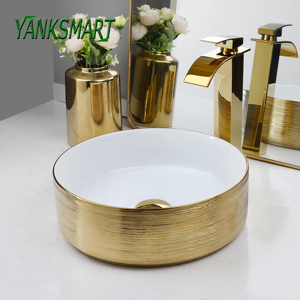 YANKSMART Gold Runder Keramik Waschbecken Wasserhahn Goldener Einhandmischer Wasserfallarmatur mit Pop-up-Ablaufgarnitur Set
