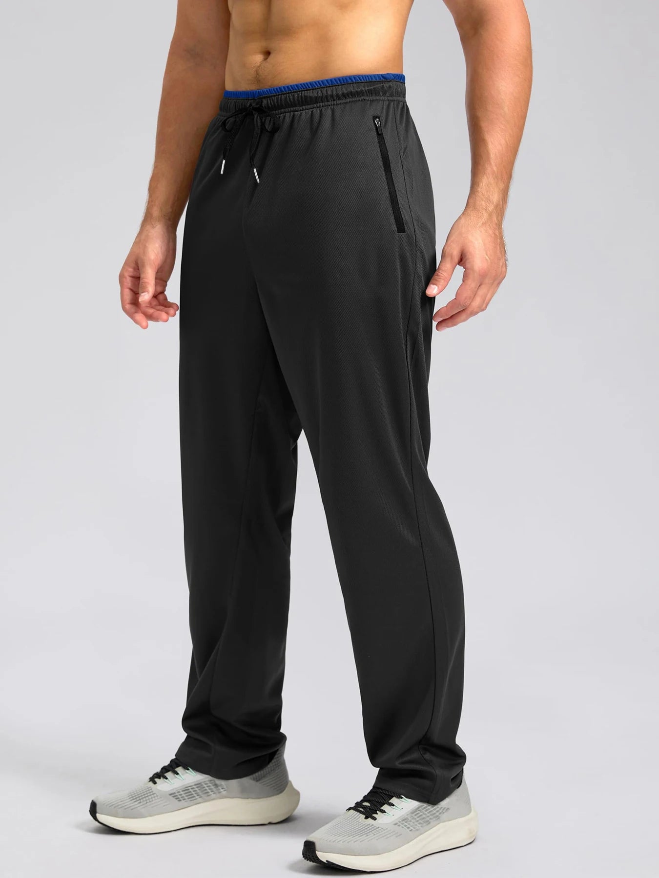 Pantalon de sport léger, respirant et à séchage rapide pour homme, avec taille élastique et poches zippées, idéal pour la gym, les loisirs, la course et la randonnée