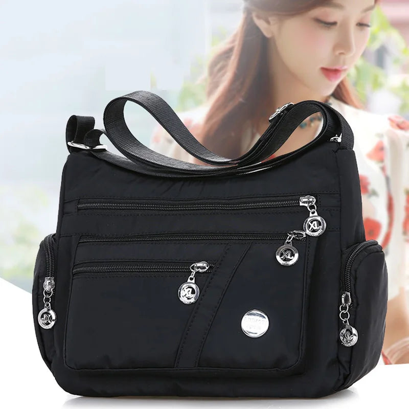 Damen Umhängetasche Wasserdichte Tragetasche Lässige Nylon Handtasche RFID Leichte Kuriertasche