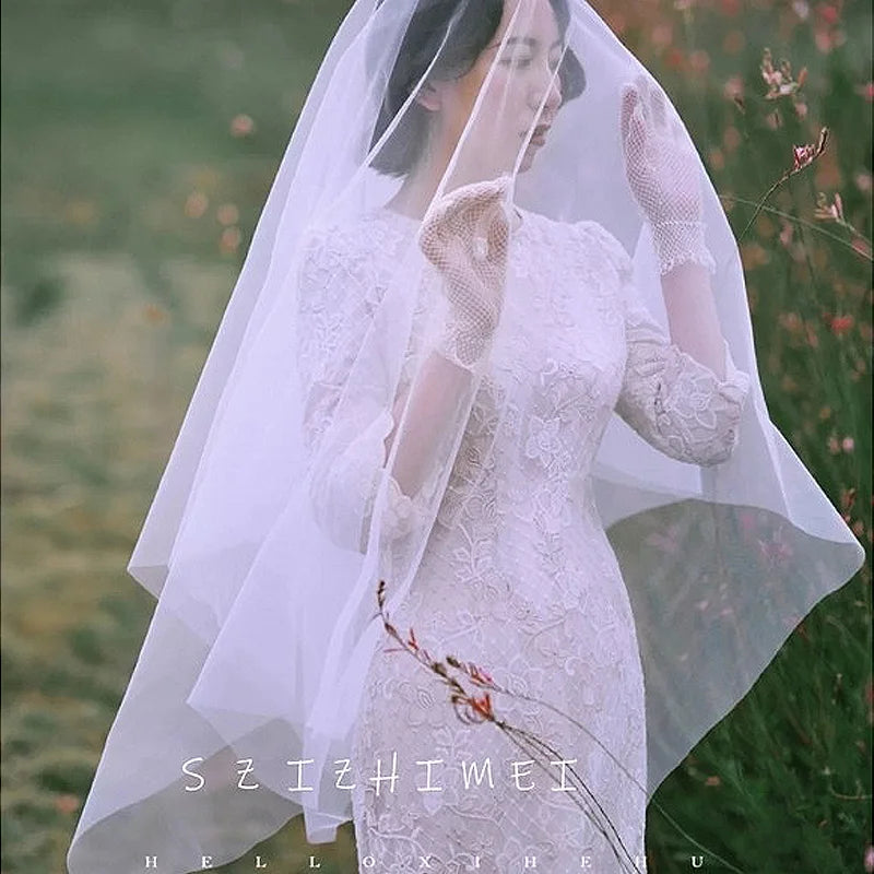 Le tissu en tulle à mailles fines micro-élastiques haute résistance de 160 cm de large est utilisé pour coudre les dessous de robes de soirée et de robes de mariée.