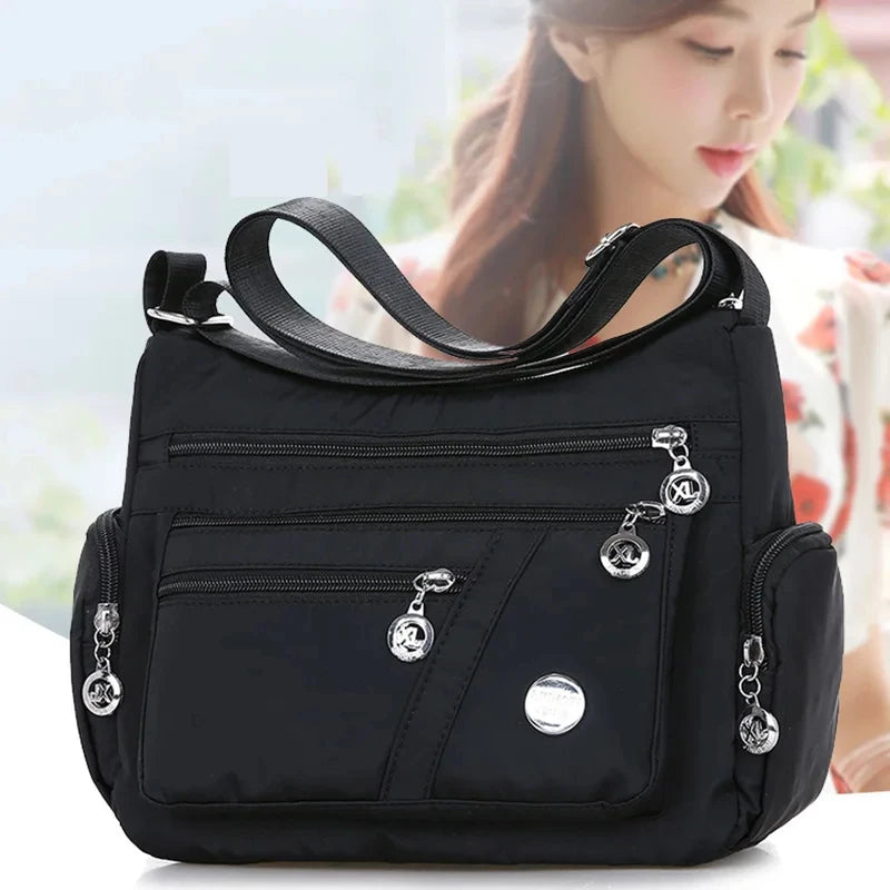 Damen Umhängetasche Wasserdichte Tragetasche Lässige Nylon Handtasche RFID Leichte Kuriertasche
