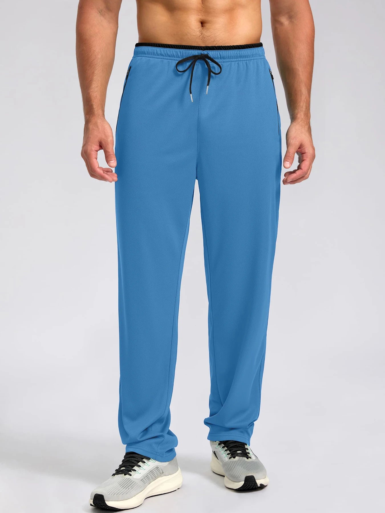 Pantalon de sport léger, respirant et à séchage rapide pour homme, avec taille élastique et poches zippées, idéal pour la gym, les loisirs, la course et la randonnée