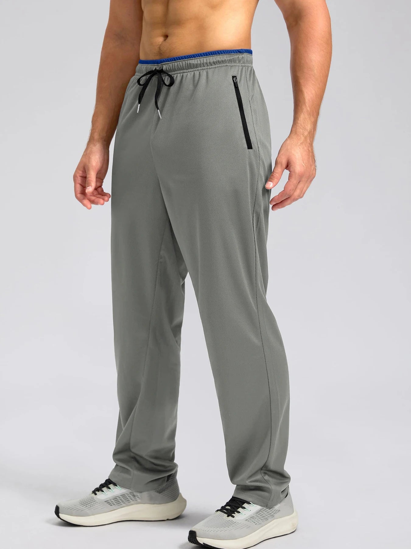 Pantalon de sport léger, respirant et à séchage rapide pour homme, avec taille élastique et poches zippées, idéal pour la gym, les loisirs, la course et la randonnée