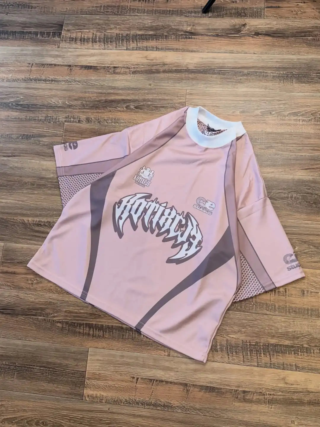 Herren und Damen Sportliche Atmungsaktive Rundhals-T-Shirts mit Spleiß-Kurzarm Hellrosa Serie Schlichte Oversized-Baseballtrikots