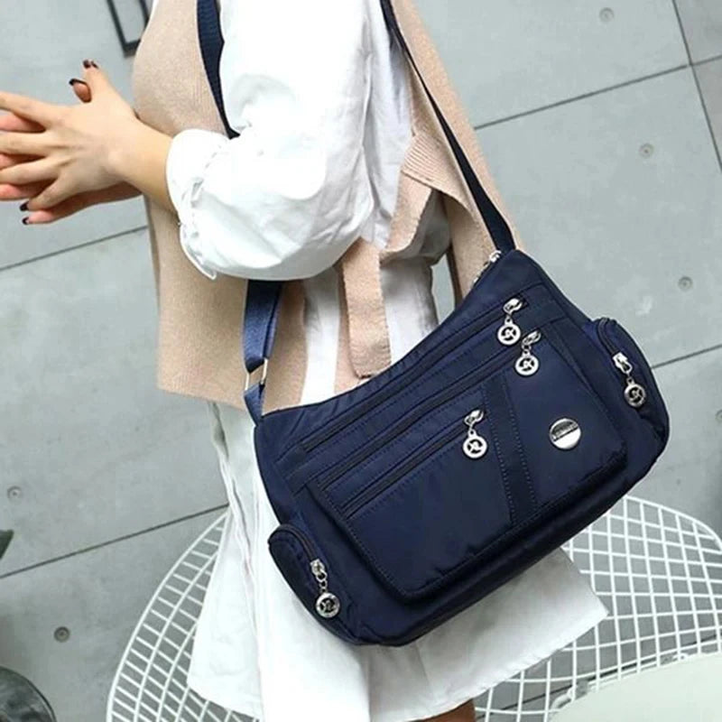 Damen Umhängetasche Wasserdichte Tragetasche Lässige Nylon Handtasche RFID Leichte Kuriertasche