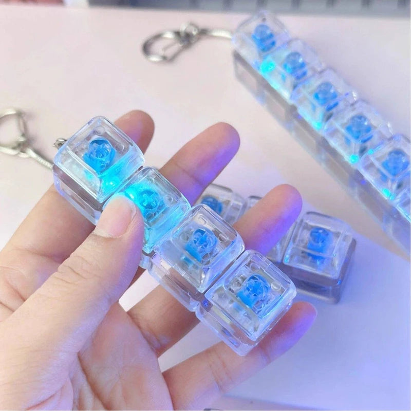 Porte-clés Clavier LED Jouets Fidget Crystal Clicker Jouet Sensoriel pour Soulagement du Stress Porte-clés Clavier Cadeau de Fête d'Anniversaire pour Enfants