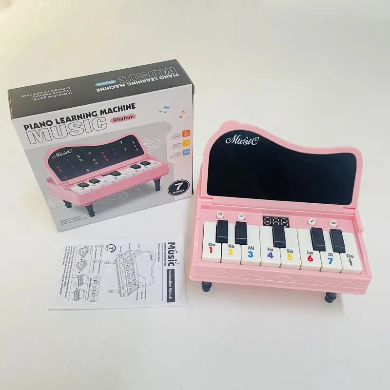 A handheld mini desktop piano with lights, music, electronic keyboard rhythm, and a game console for completing levels; a Montes