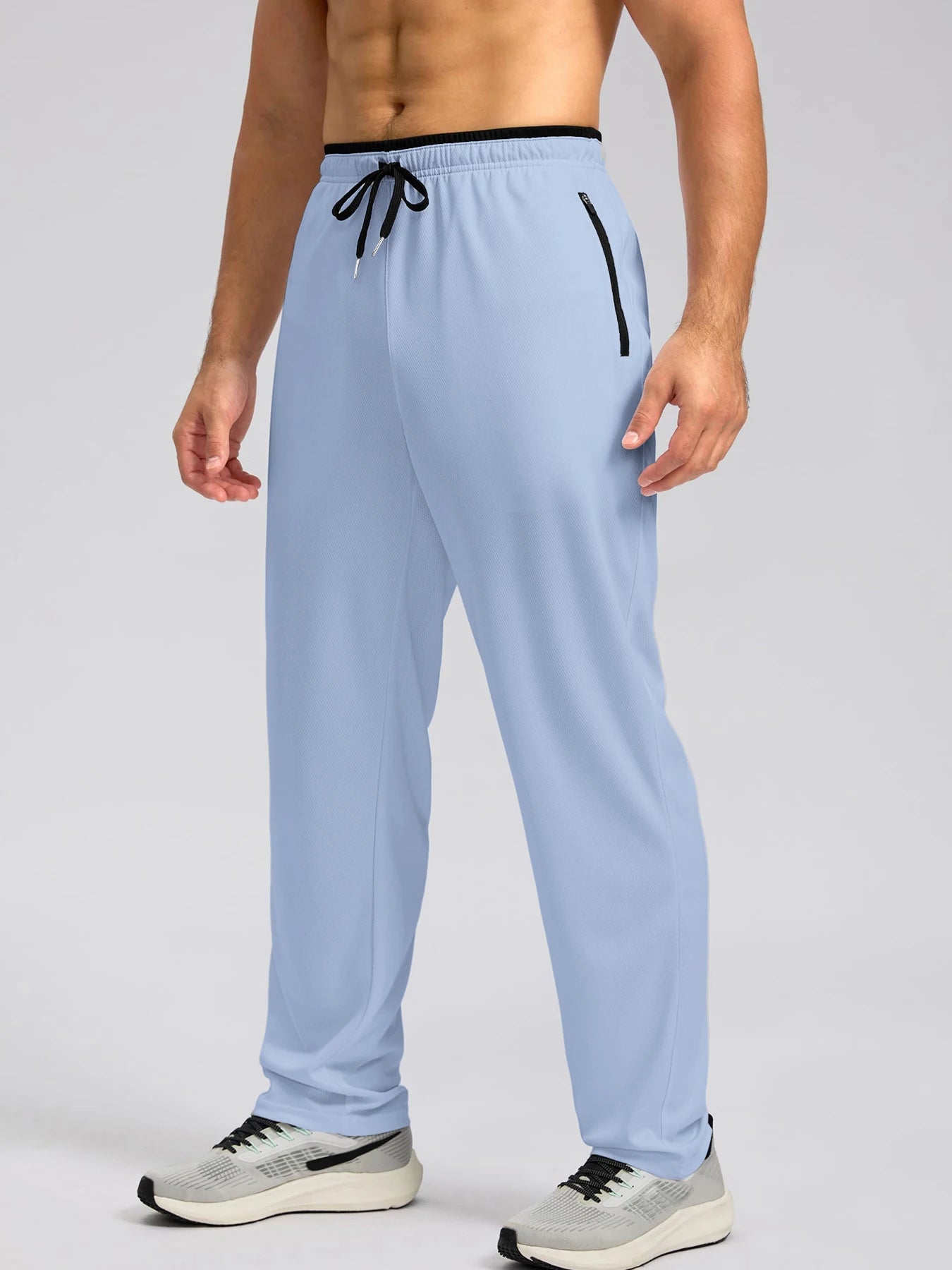 Pantalon de sport léger, respirant et à séchage rapide pour homme, avec taille élastique et poches zippées, idéal pour la gym, les loisirs, la course et la randonnée