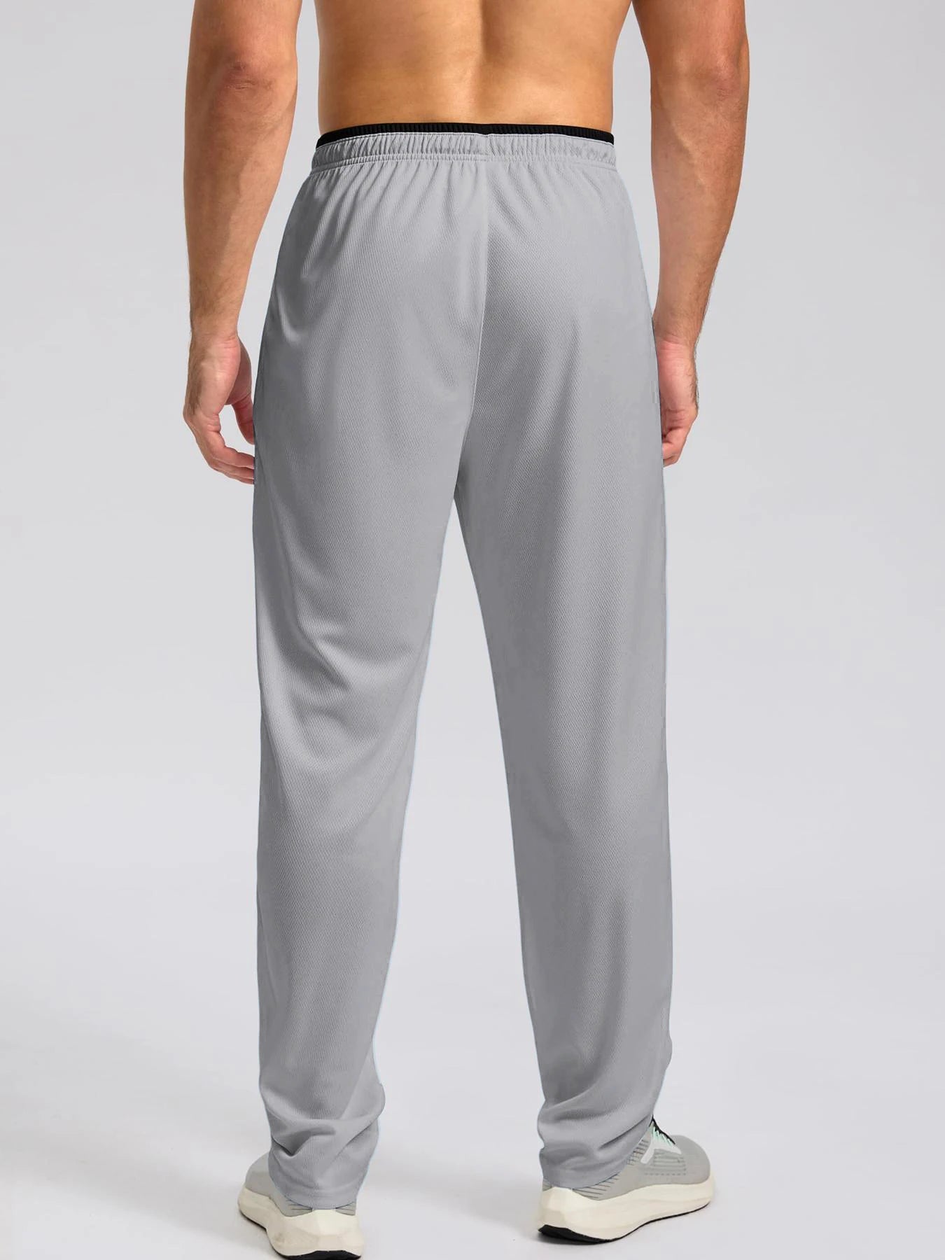 Pantalon de sport léger, respirant et à séchage rapide pour homme, avec taille élastique et poches zippées, idéal pour la gym, les loisirs, la course et la randonnée