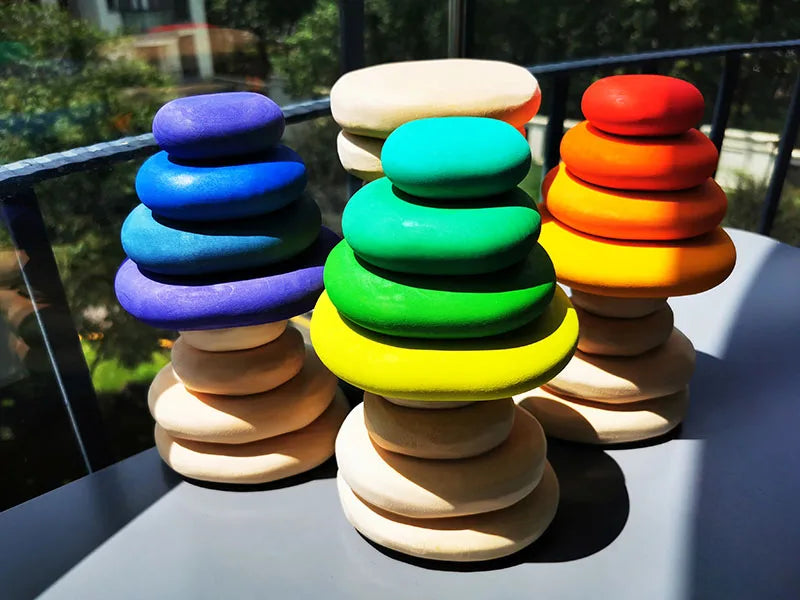 Holzspielzeug für Kinder Regenbogenfluss-Kieselsteine Puppen Ringe Bälle Bau- und Stapelklötze