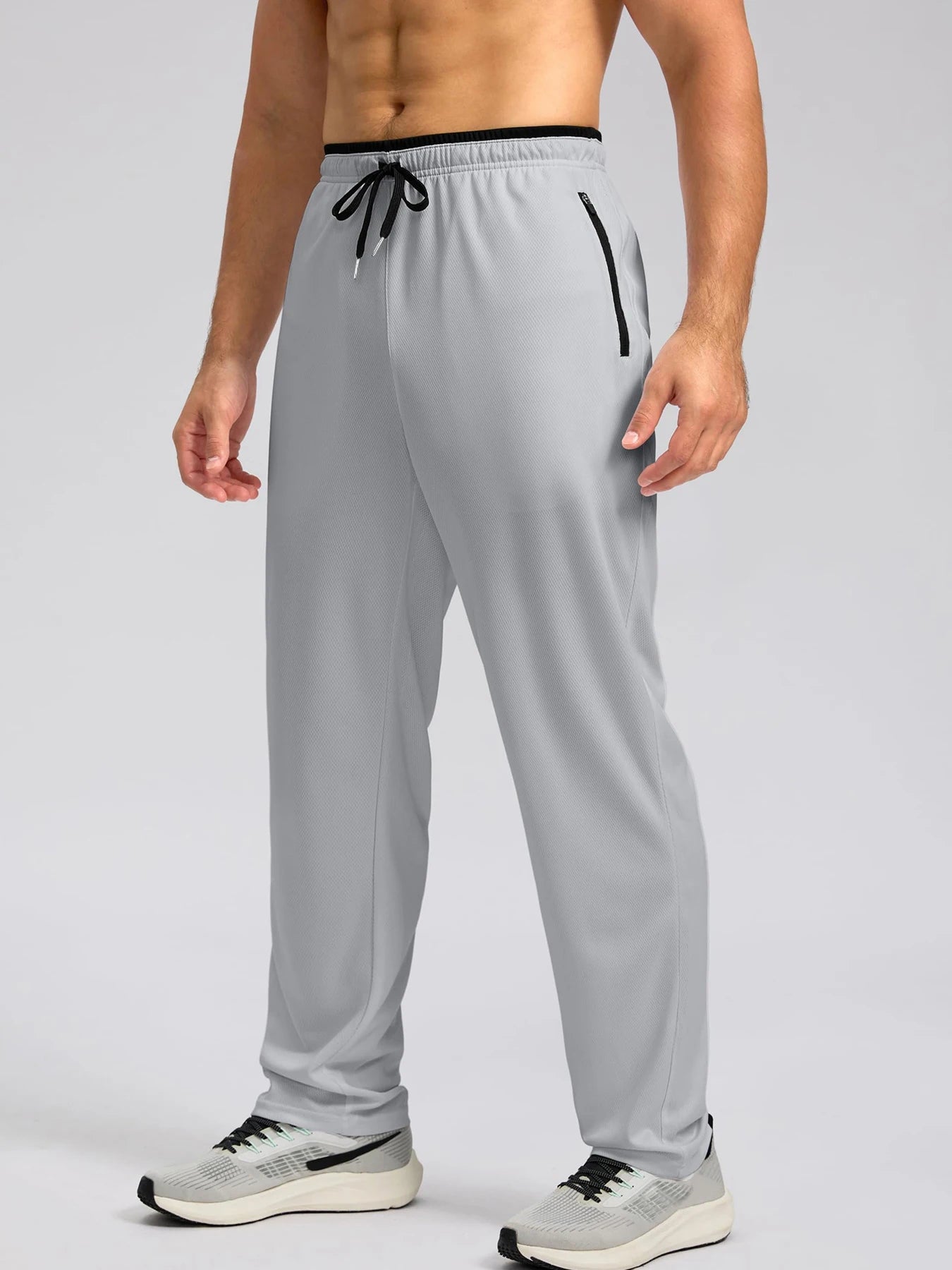 Pantalon de sport léger, respirant et à séchage rapide pour homme, avec taille élastique et poches zippées, idéal pour la gym, les loisirs, la course et la randonnée